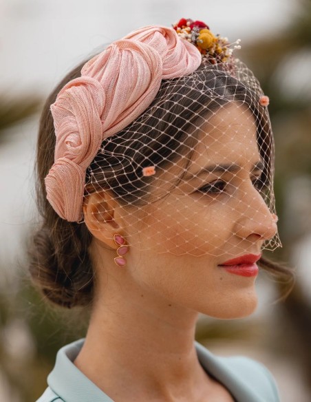 Ruffled party headband with knots and floral side trimming