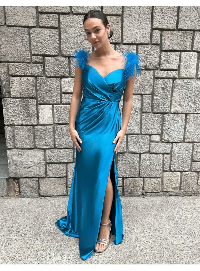 Party dress for guest with feathers on the...