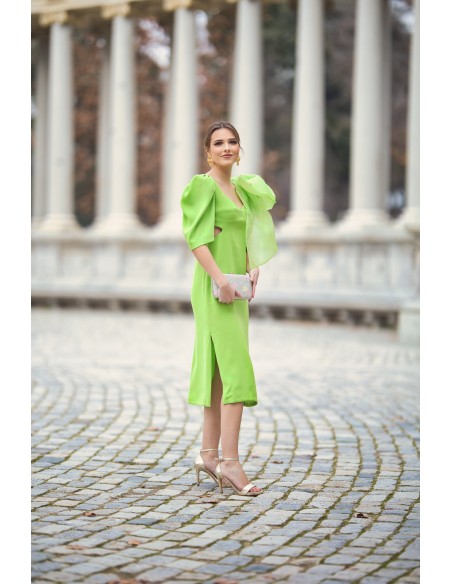 Vestido midi para invitada con maxi lazo y cut-out