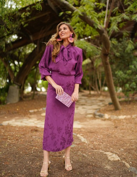 Purple blouse with shoulder pads and lacing