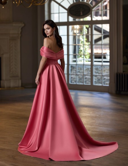 Long guest dress with asymmetrical neckline and train skirt