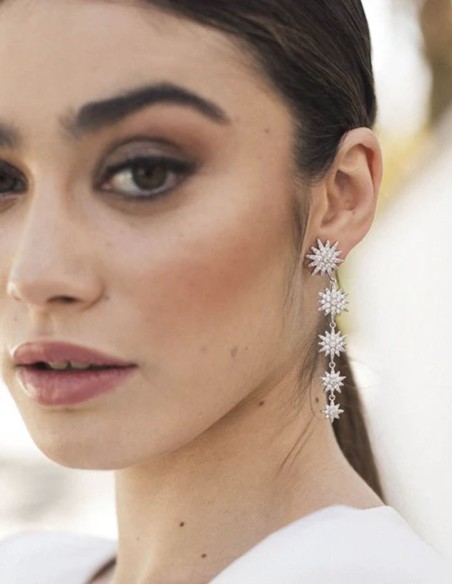 Long party earrings with five stars