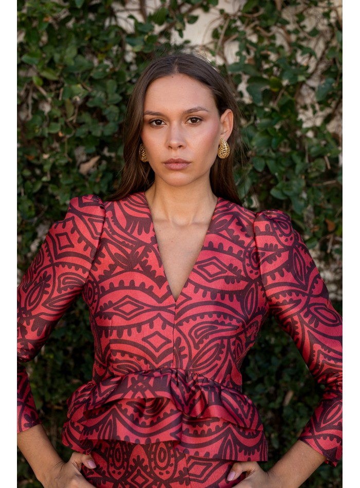 Red and burgundy print blouse with puffed sleeves