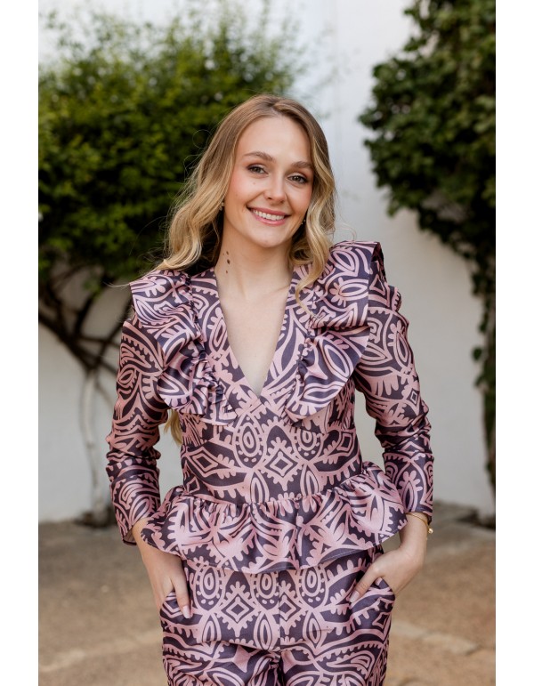 Pink printed blouse with peplum neckline and frill
