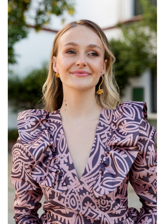 Pink printed blouse with peplum neckline and frill