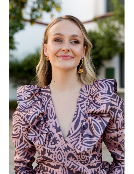 Pink printed blouse with peplum neckline and frill
