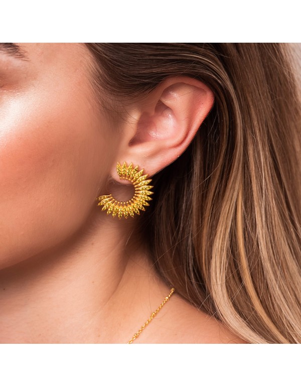 Pendientes dorados circulares con circonitas