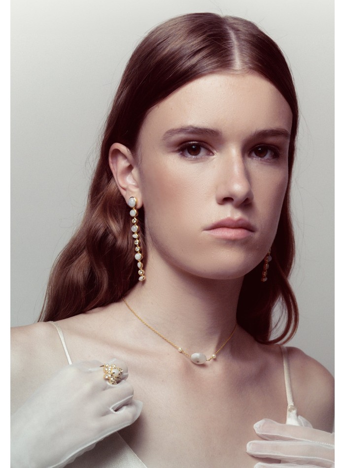 Long earrings with multiple pieces of moonstones