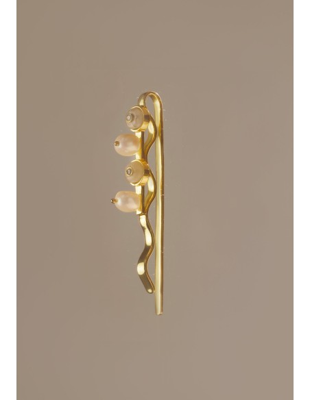 Horquilla dorada con piedras blancas