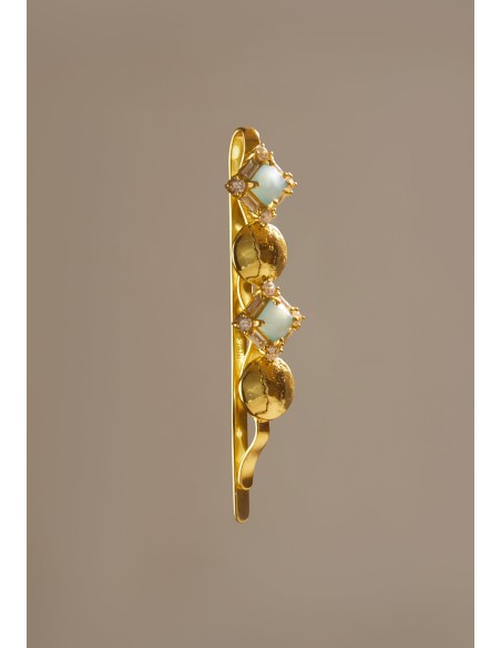 Horquilla dorada con piedras