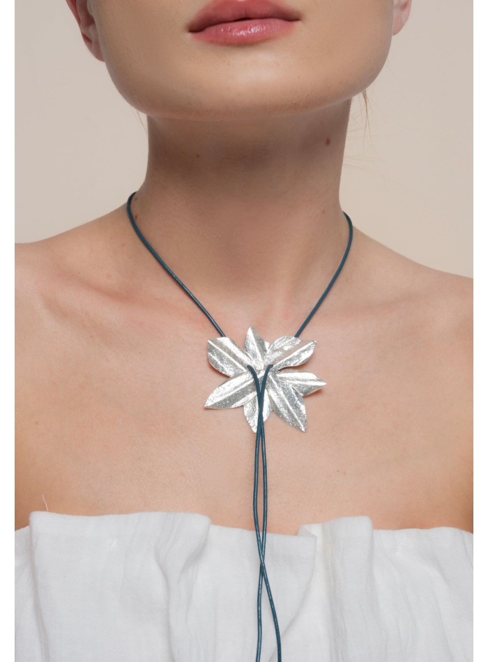 Silver plated necklace in the shape of lotus...