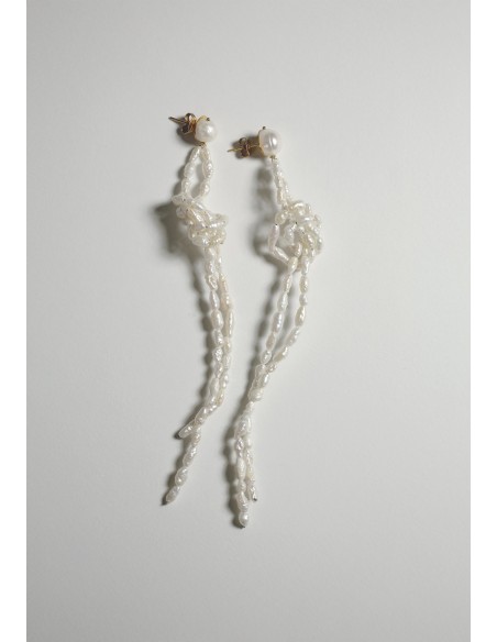 Longues boucles d'oreilles en perles avec nœud