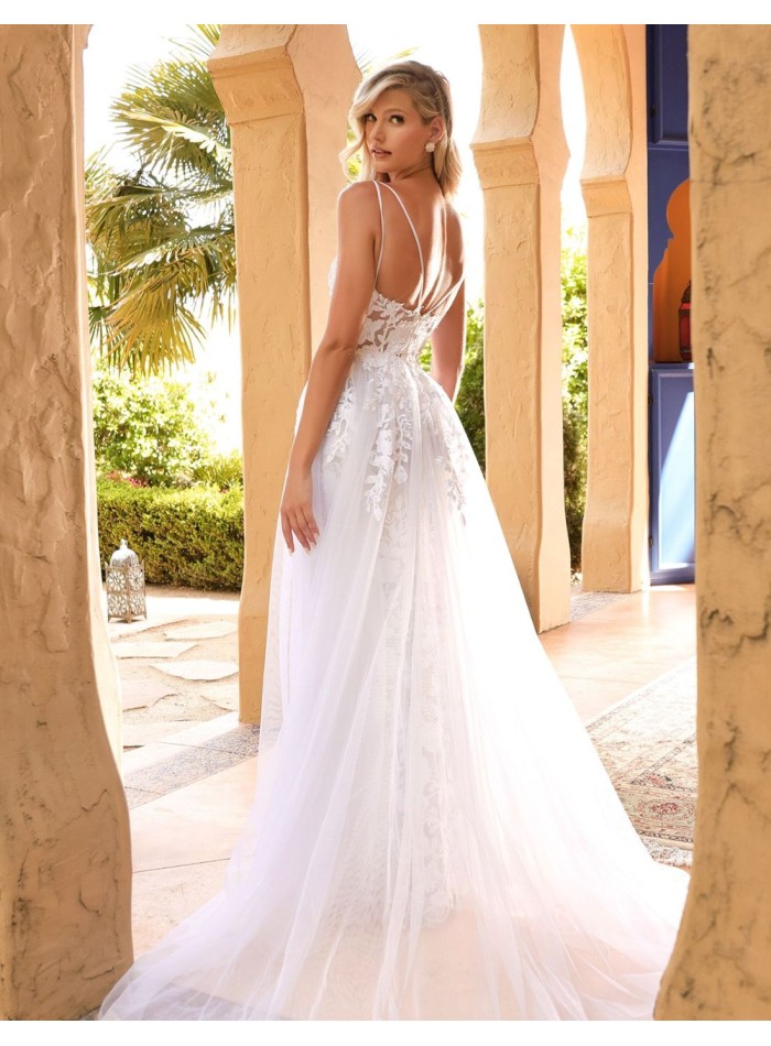 Vestido de novia blanco en encaje con sobrefalda para boda religiosa