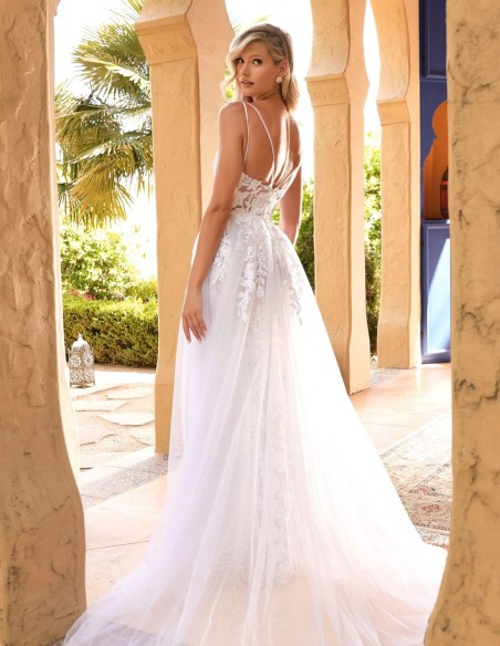 White wedding dress in lace with overskirt