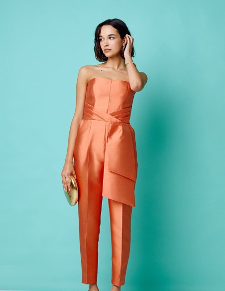 Long peach party jumpsuit with strapless neckline