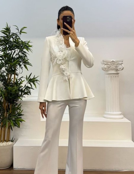 Two-piece suit with ornamental jacket and long bell-bottom pants