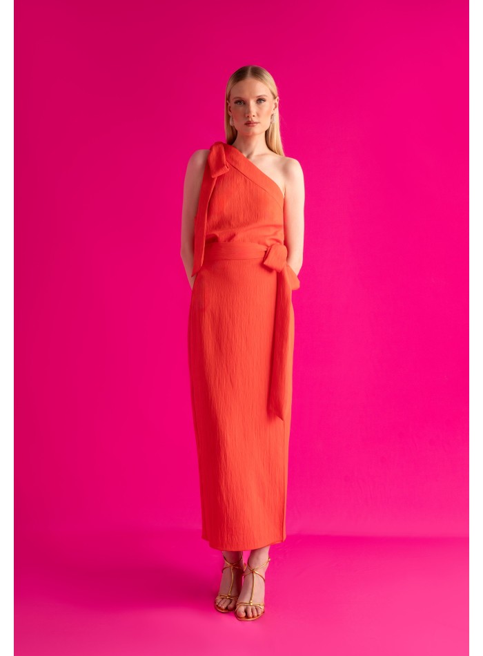 Orange asymmetrical top with lacing on the...