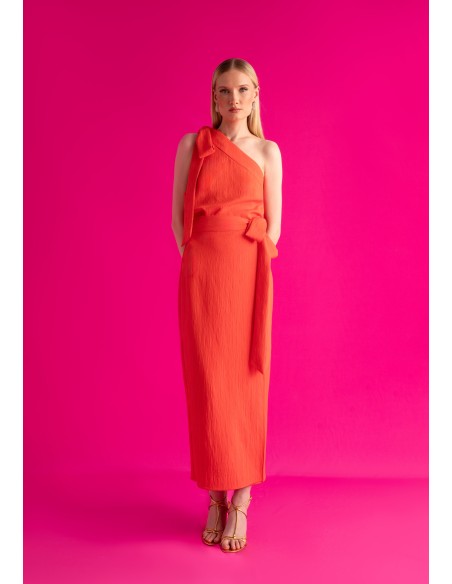 Top asymétrique orange avec laçage sur l'épaule