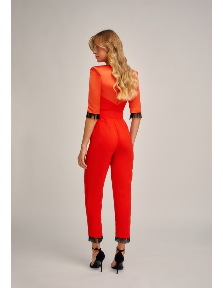 Orange party jumpsuit in crepe satin with crystal bangs