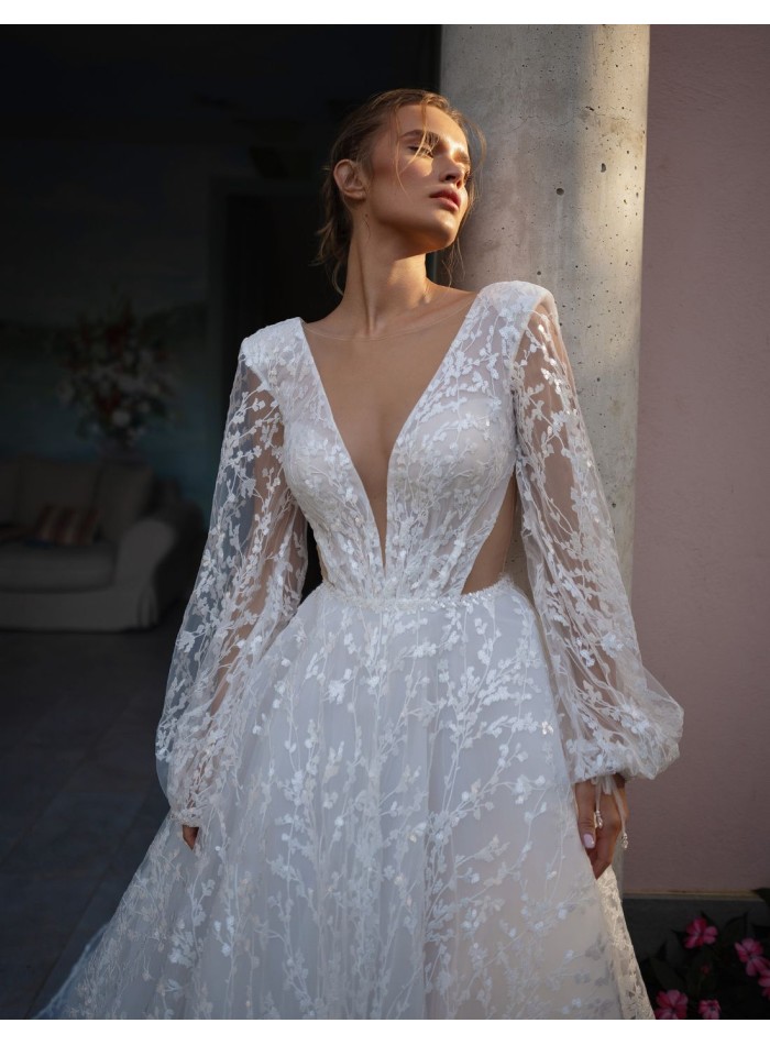 Long cut-out wedding dress with long puffed...