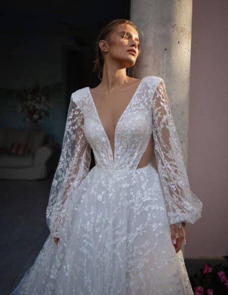 Long cut-out wedding dress with long puffed sleeves