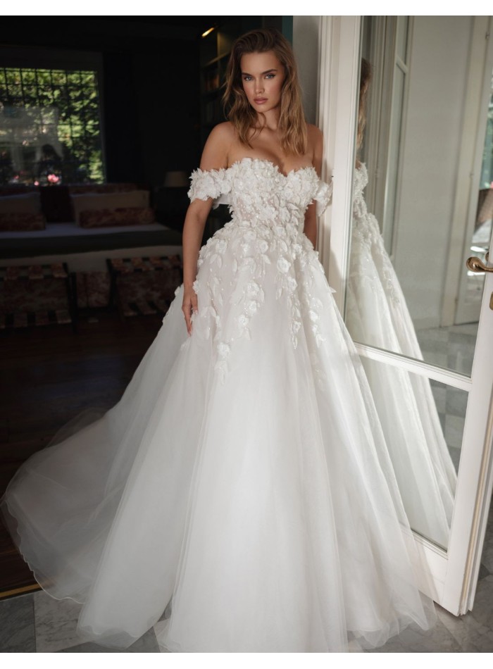Long wedding dress with bandeau neckline and...