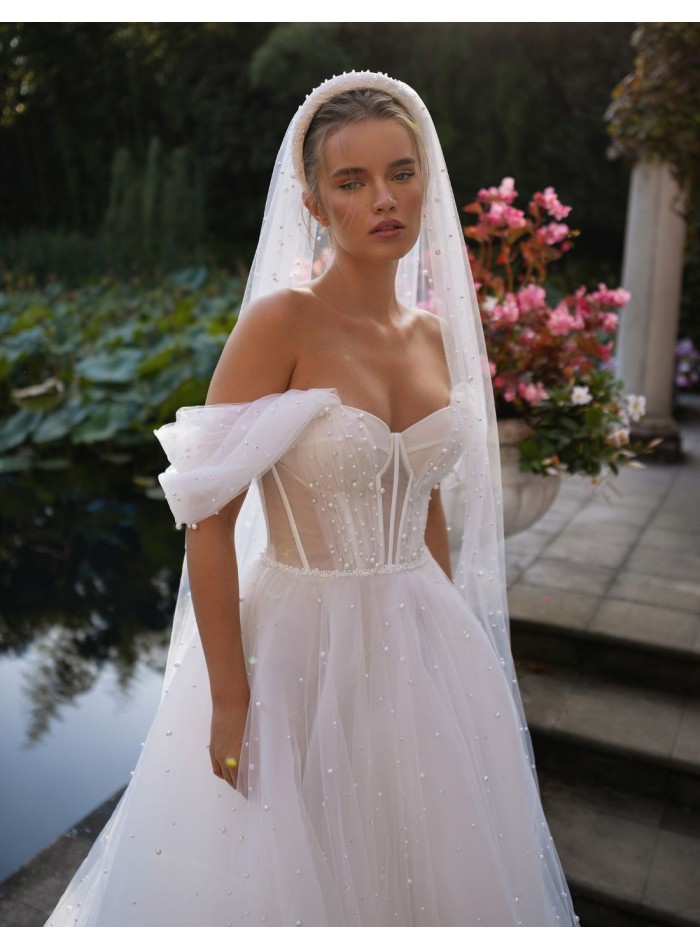 Ivory wedding dress with sweetheart neckline...