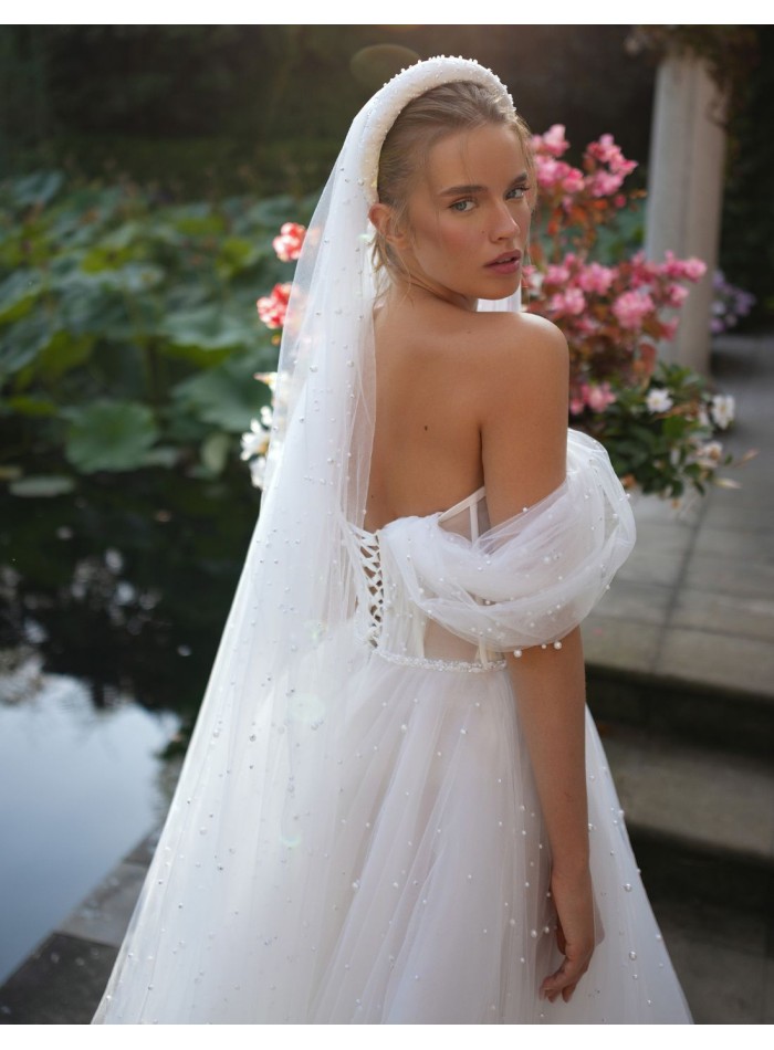 Ivory wedding dress with sweetheart neckline...