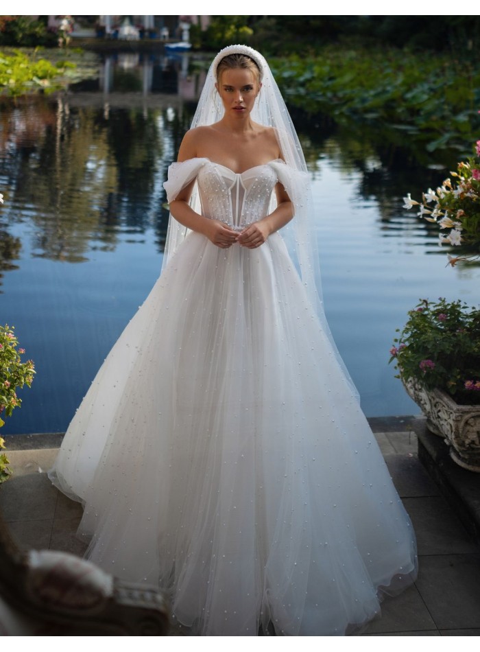 Ivory wedding dress with sweetheart neckline...