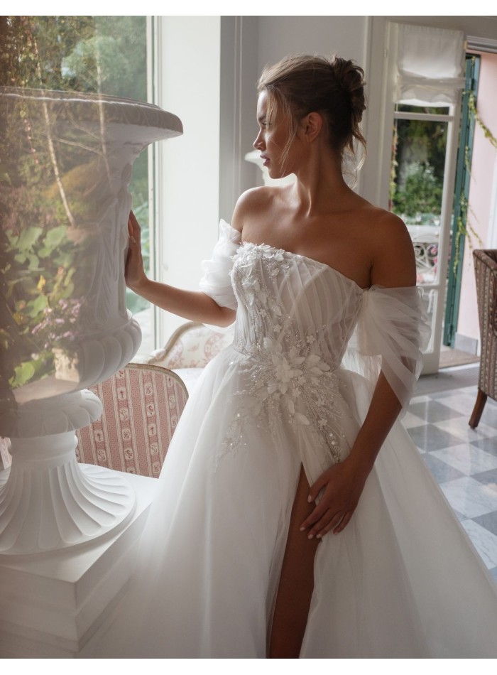 Vestido de novia marfil en tul con escote