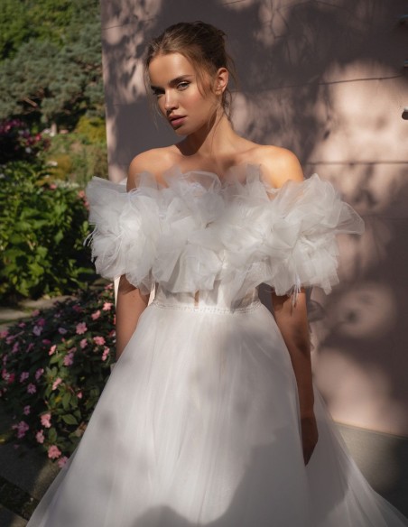 Ivory wedding dress in tulle with sweetheart neckline and elegant bolero