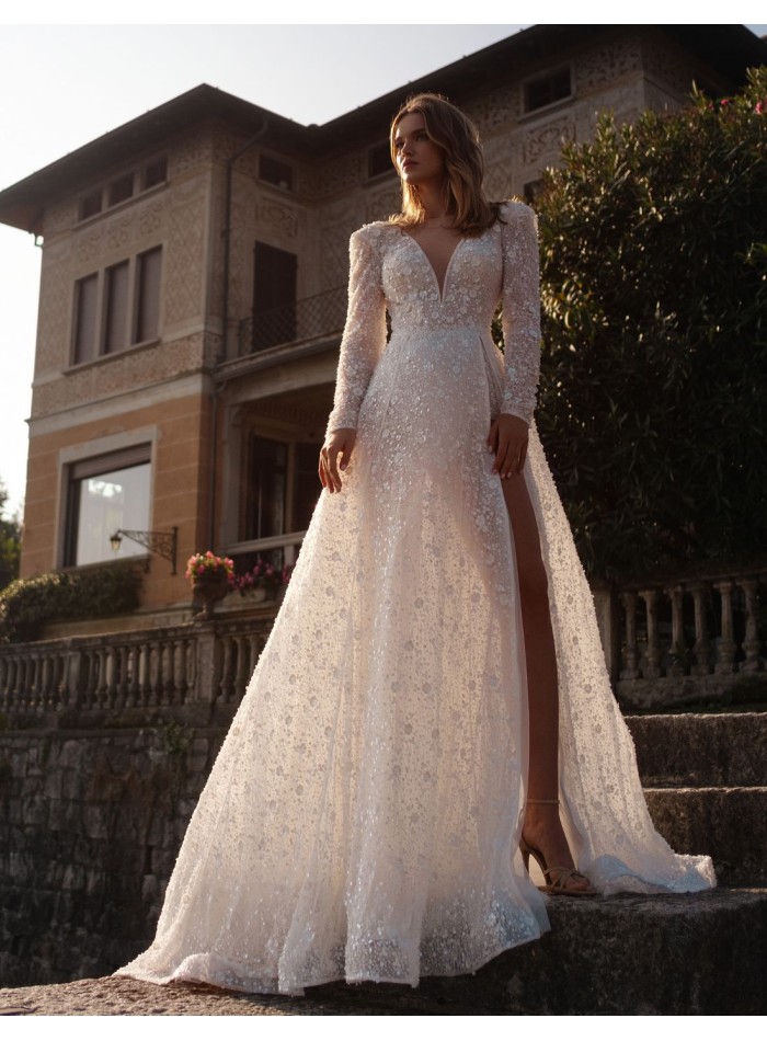 Vestido de novia marfil en encaje y pedrería