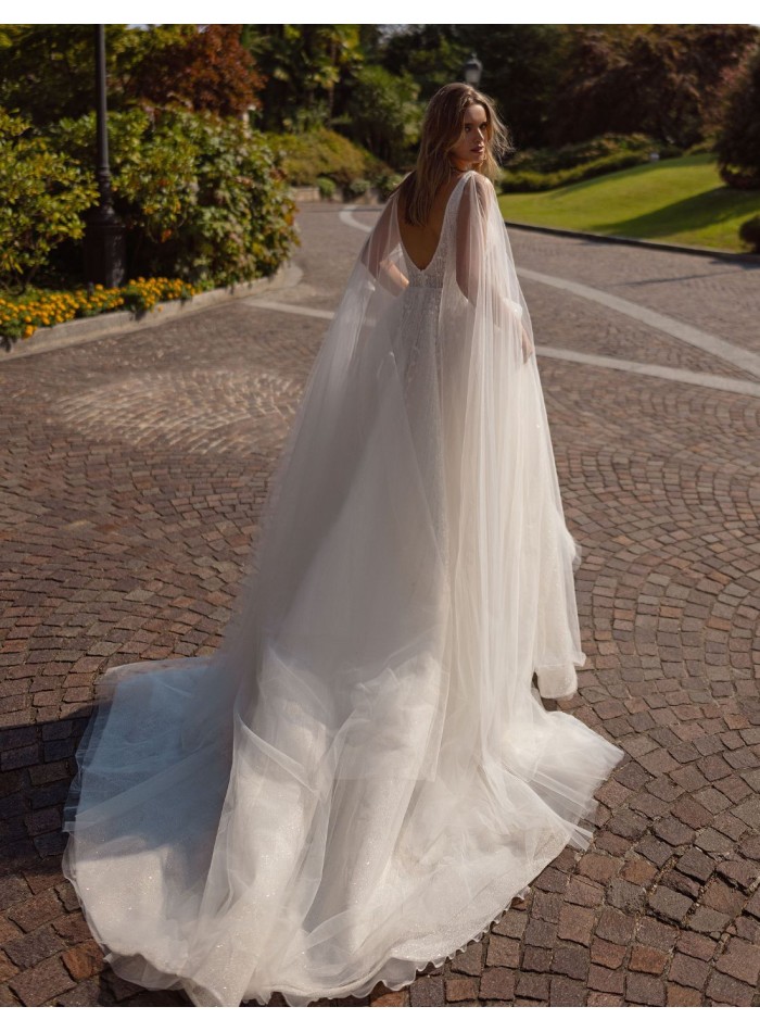 Vestido de novia marfil línea A con escote en...