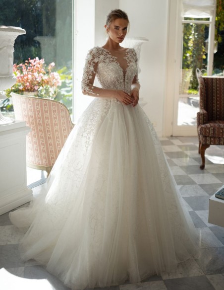 Ivory ivory wedding dress with illusion neckline, lace and princess silhouette