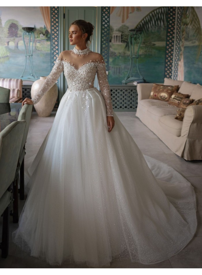 Vestido de novia marfil con escote y espalda...