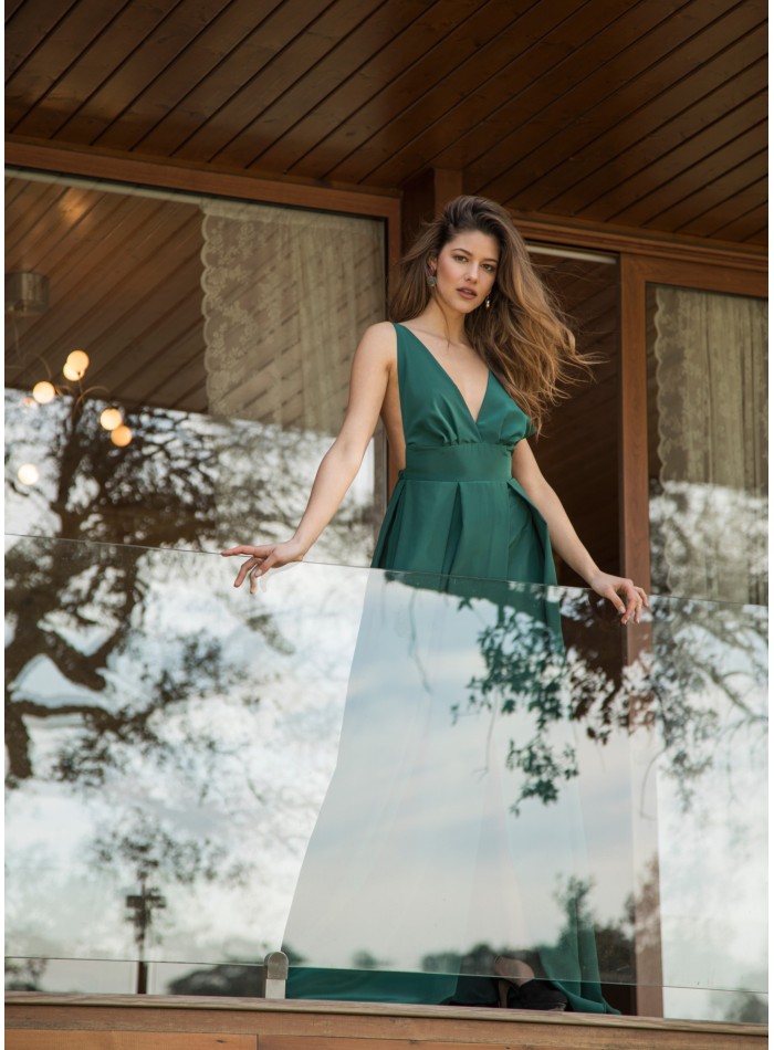 Long green dress with plunging neckline and...