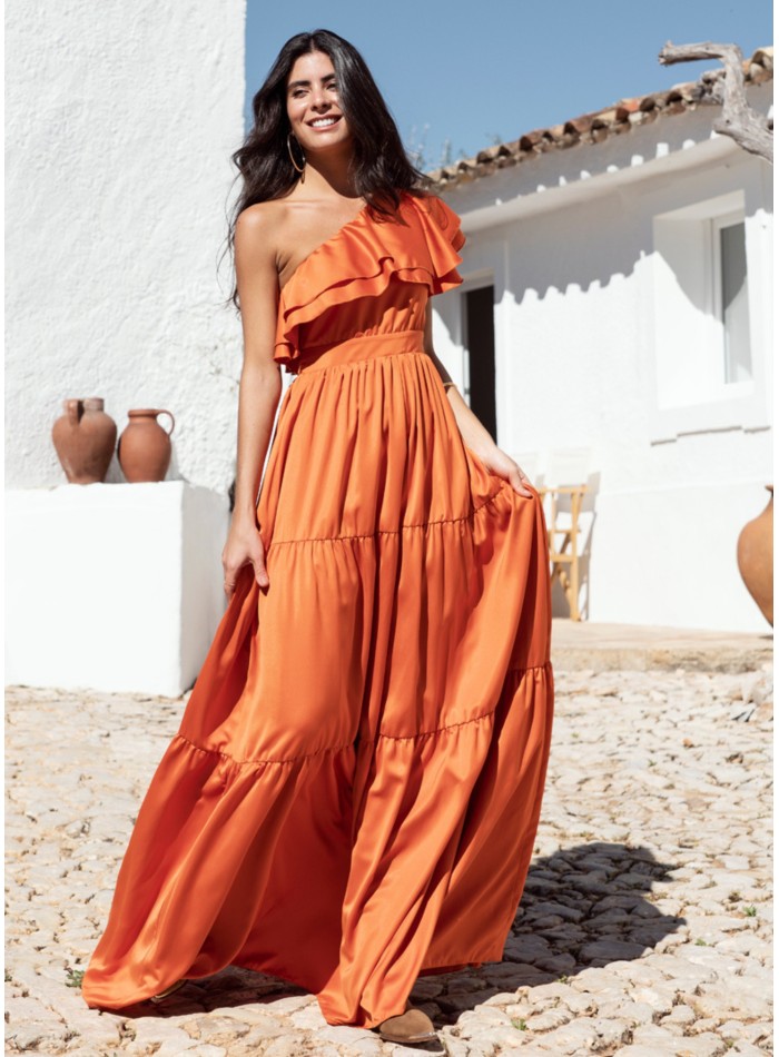 Long orange dress with ruffles and asymmetrical...