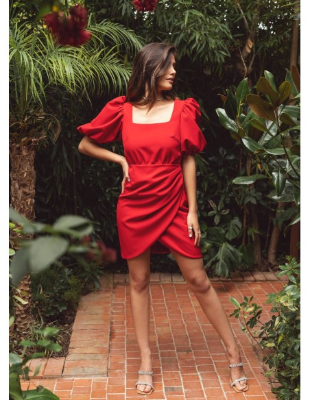 Short red dress with square neckline and draped skirt