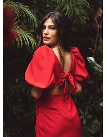 Short red dress with square neckline and draped skirt