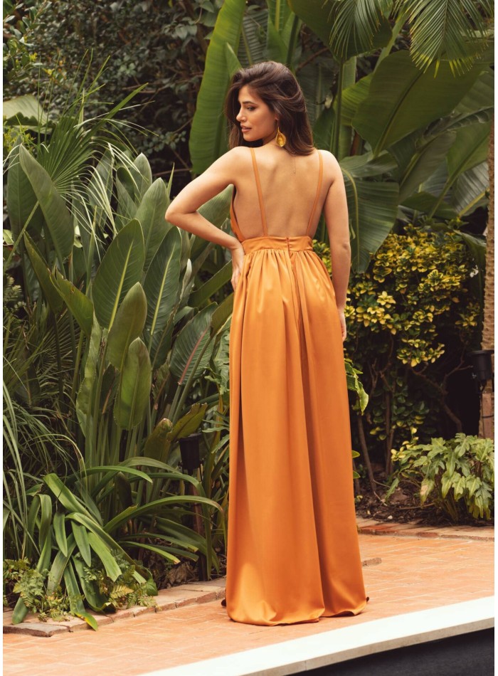 Terracotta long dress with plunging neckline...