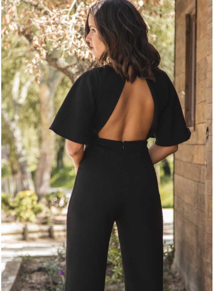 Black long jumpsuit with crossed neckline and...