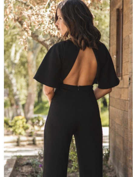 Combinaison longue noire avec encolure croisée et dos ouvert