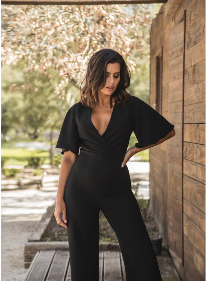 Black long jumpsuit with crossed neckline and...