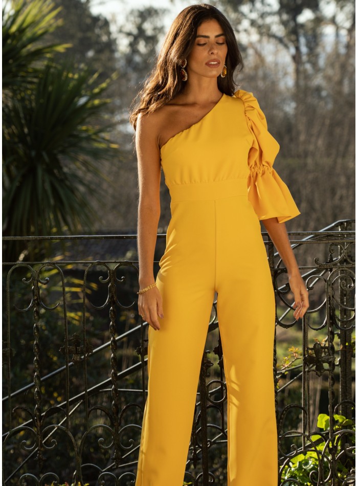 Yellow long jumpsuit with asymmetrical neckline...