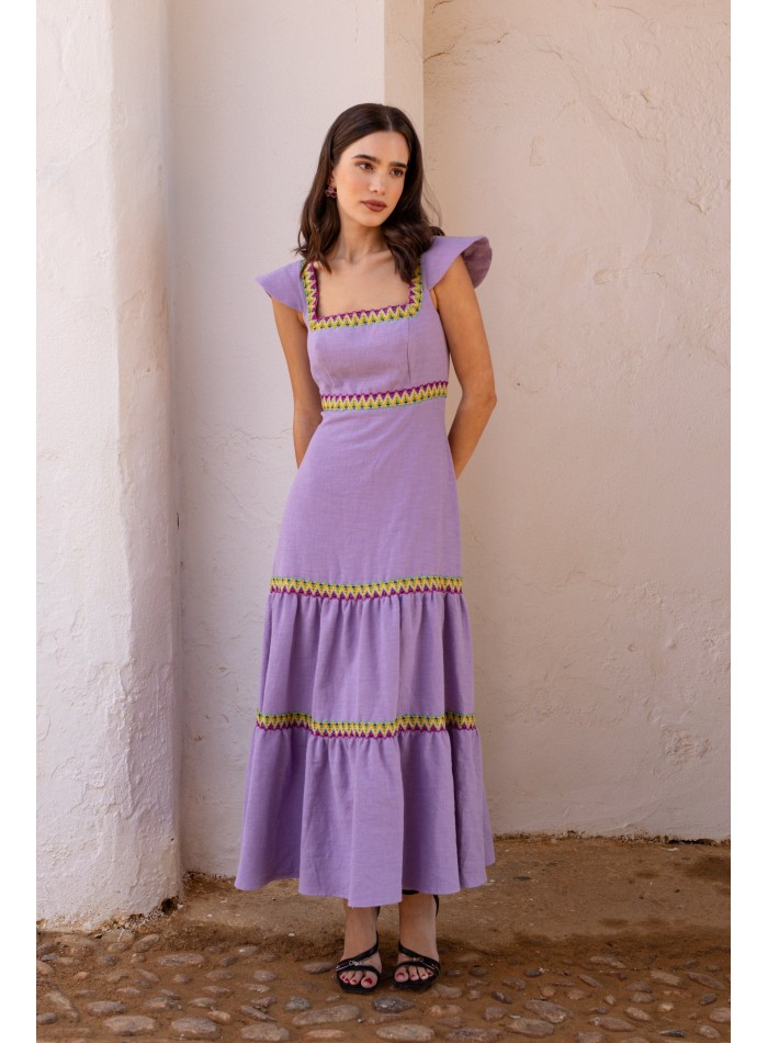 Vestido para invitada con falda de volantes y...