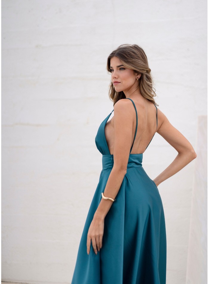 Turquoise princess cut dress with plunging...