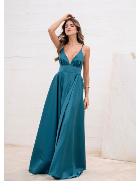 Turquoise princess cut dress with plunging neckline