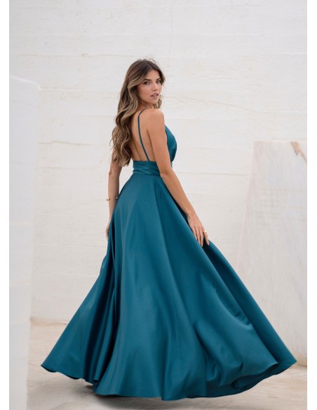 Turquoise princess cut dress with plunging neckline