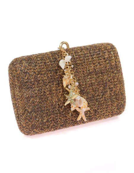 Raffia clutch bag with small shells and conch shells