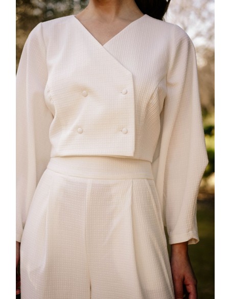 Veste courte à double boutonnage avec boutons et manches larges